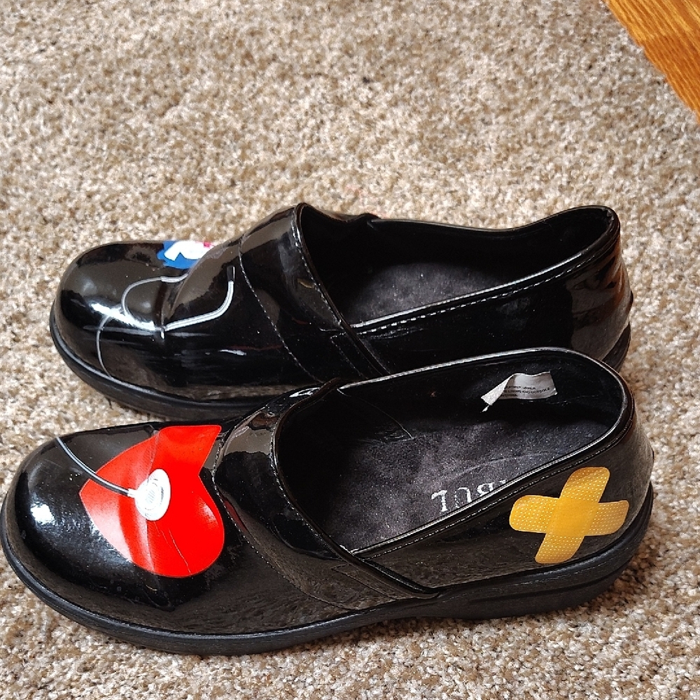 Stylish Black Kids Shoes with Red and Yellow Accents